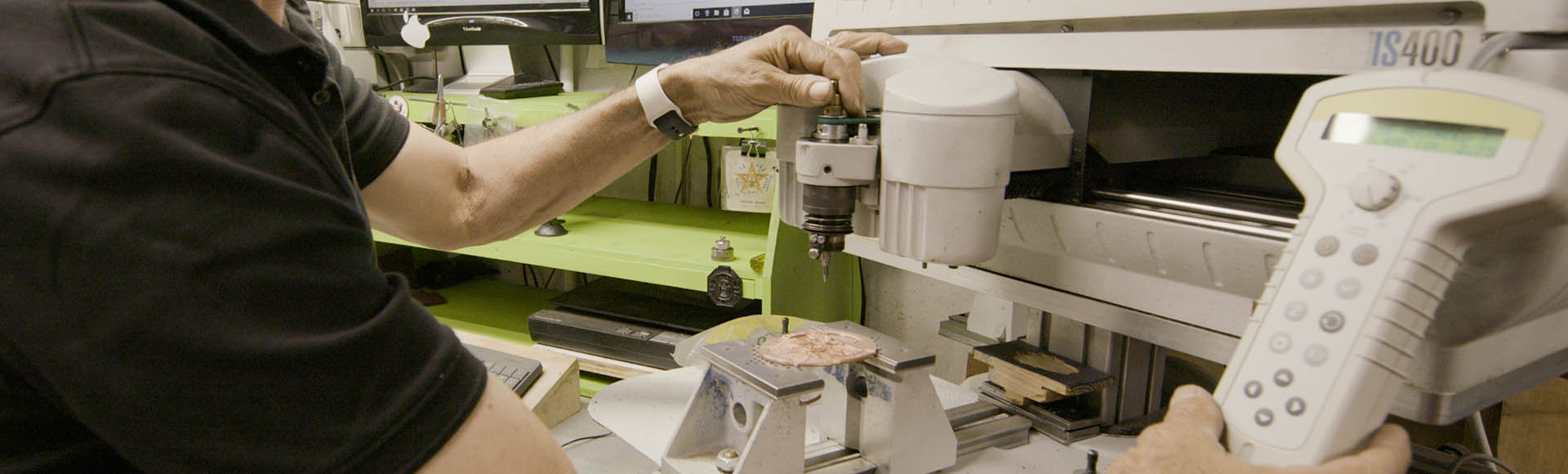 badges being engraved