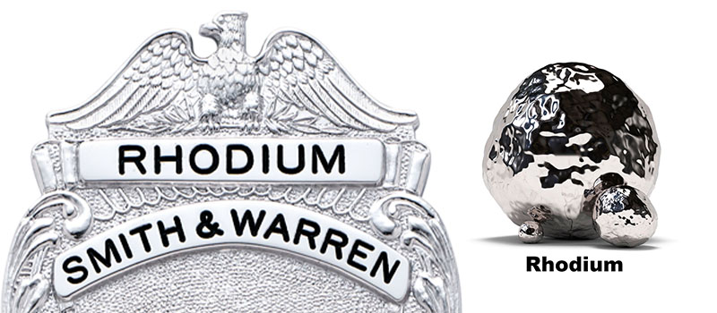 A rhodium badge sample with material